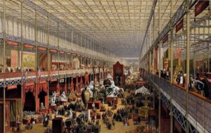18.12_8_EXPO-1851-Crystal-Palace-interno-McNeven-J.-The-Foreign-Department-viewed-towards-the-transept-coloured-lithograph-1851-Wikimedia-Commons copia